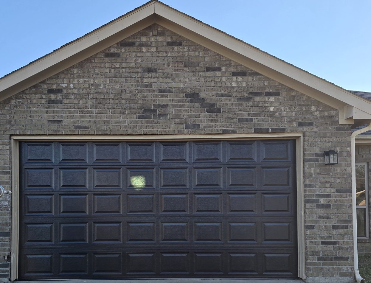 A single dark raised-panel door.
