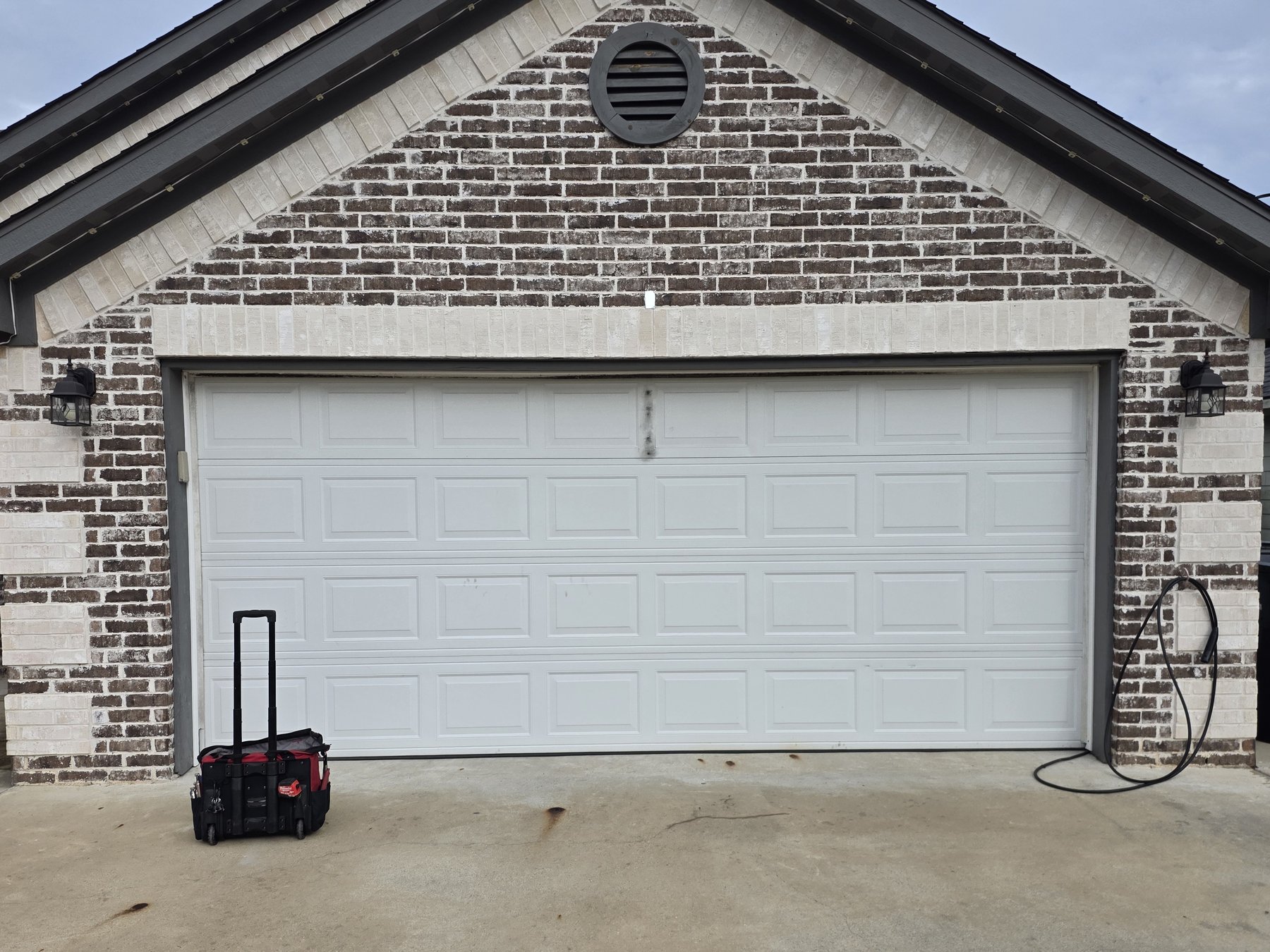 After: the same door, back on track and closing straight.